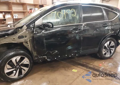 2016 Honda Cr-V Touring z USA, uszkodzony, nr VIN 5J6RM4H98GL021624